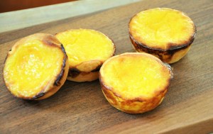 Custard Tarts -- as they should be -- using rough puff pastry. 